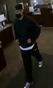 The subject is described as a Caucasian or Hispanic male adult who stands approximately 5’8” with a medium build and dark hair. At the time of the robbery, the subject had a goatee and wore a black baseball cap, black hooded sweatshirt, white undershirt, black pants, and Converse-style black and white tennis shoes.